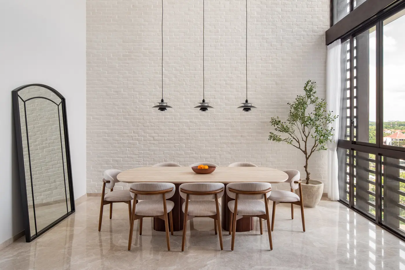 Dining from a different angle showing natural light from windows