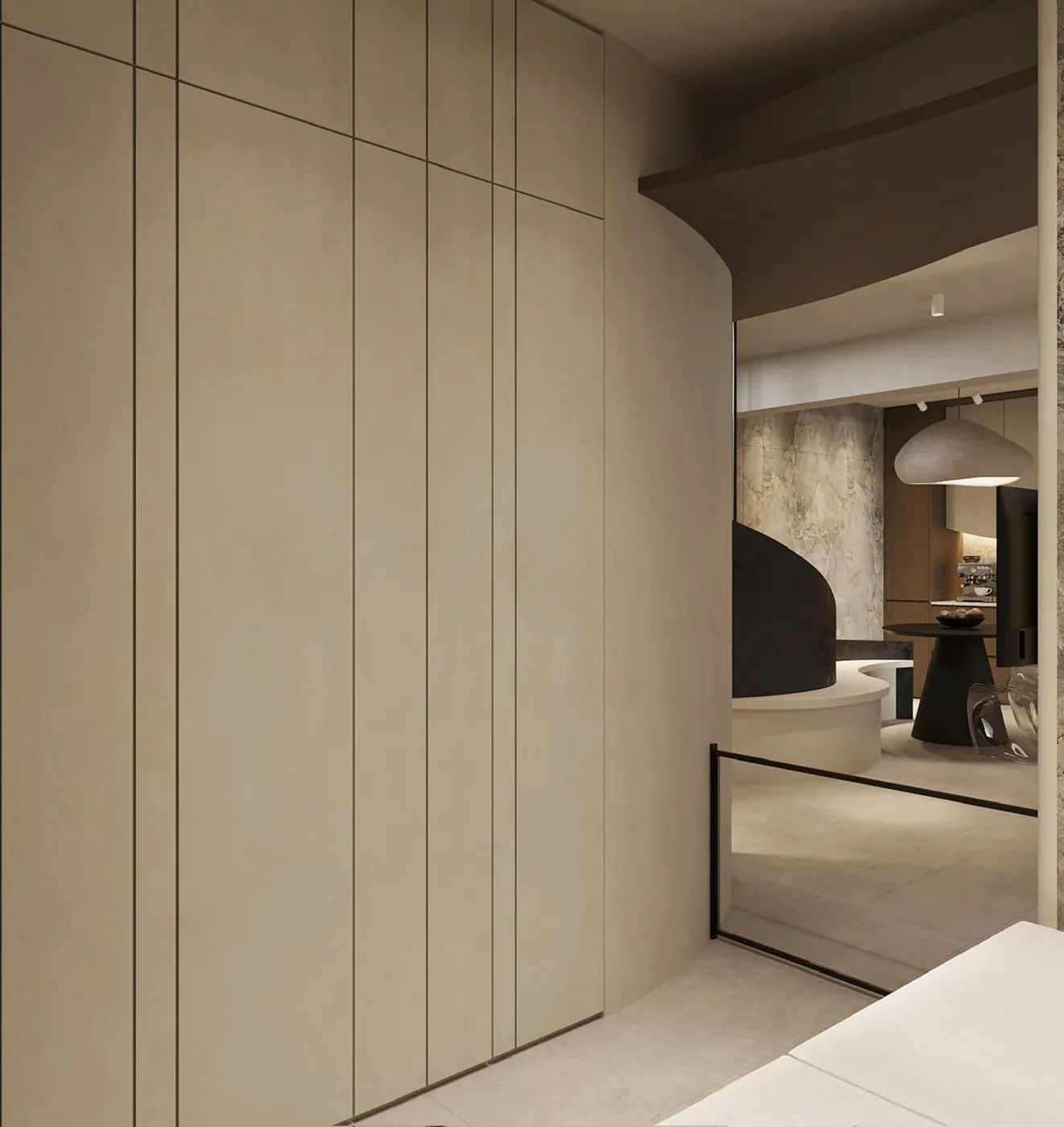Entry corridor — curved millwork and the staircase leading to the dining area beyond