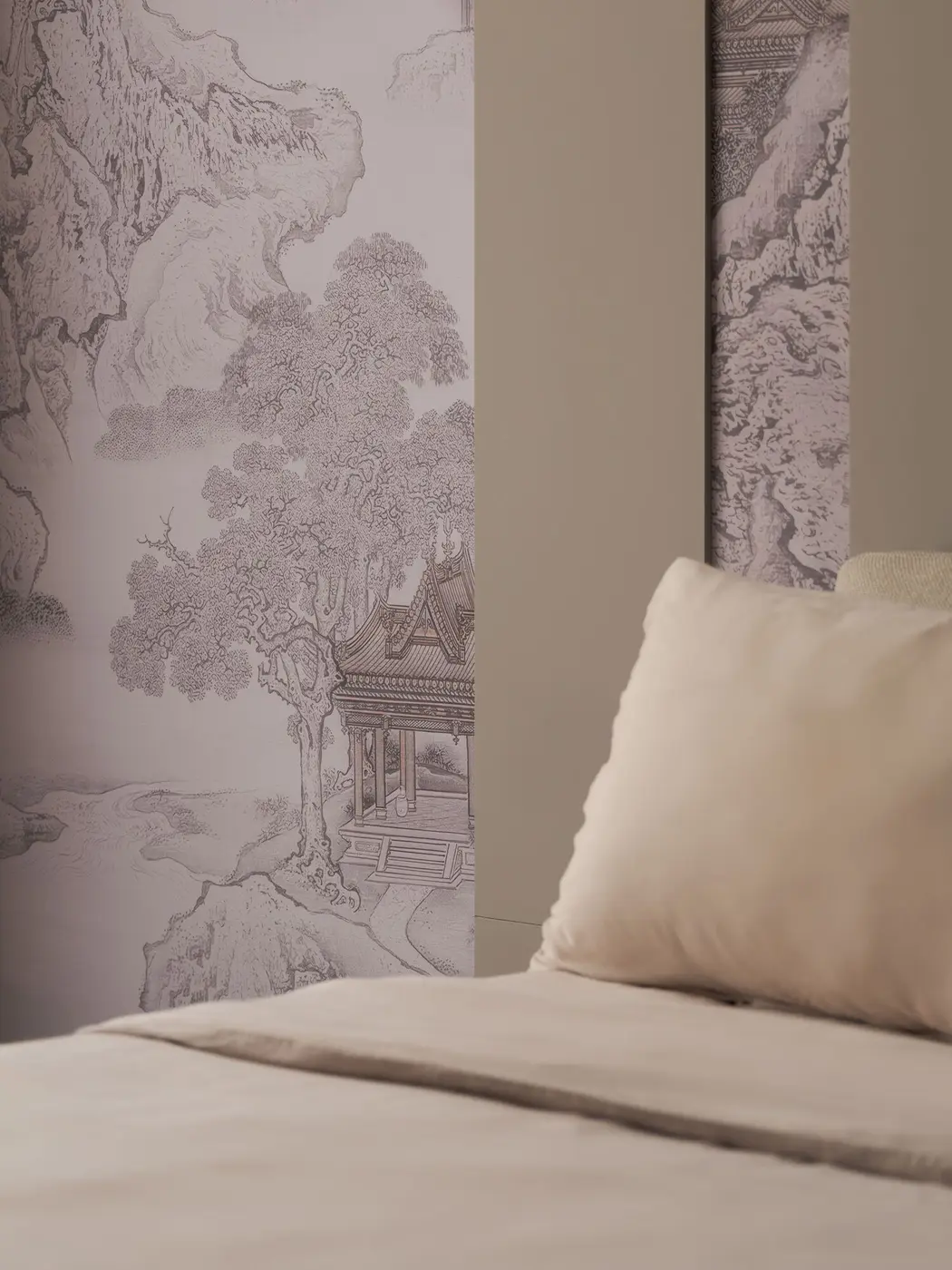 Guest bedroom — Chinese ink landscape wallpaper close-up showing mountains and temples